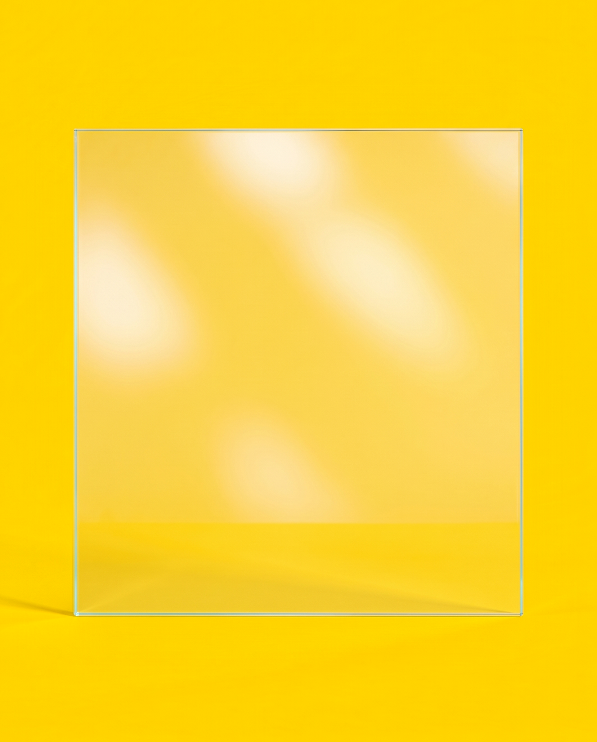 Low-iron extra clear glass panel, front view, on a yellow background