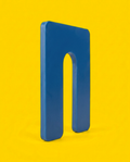 Blue 1/16 inch horseshoe shim, 3 by 4 inch plastic, standing on edge showing the moulded edge and the U-slot